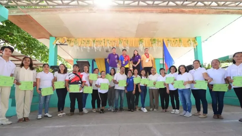 Graduation ceremony of the first batch of sewing and tailoring livelihood trainees in Brgy. San Isidro, General Santos City, with representatives from BingoPlus Foundation, Brgy. officials, and DOLE.