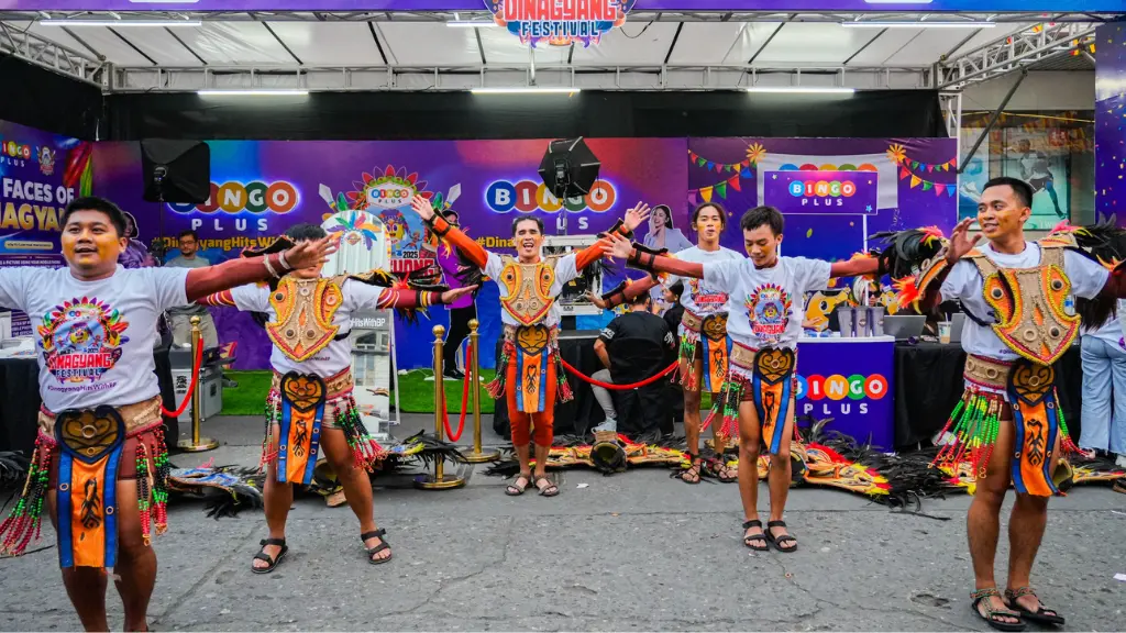 A dance group performing at the BingoPlus booth during the Dinagyang Festival.