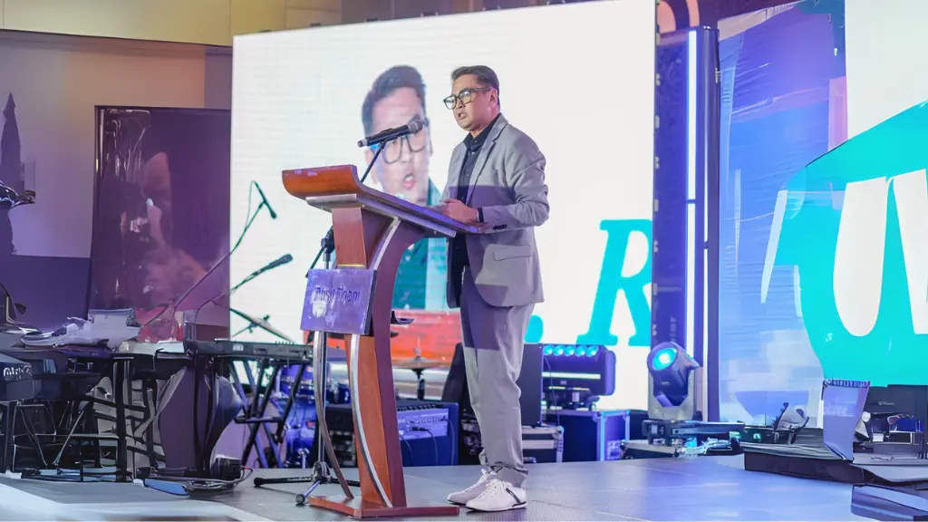 Mr. Rafael Jasper Vicencio delivering his speech as co-presenter during the 42nd anniversary of Malaya Business Insight