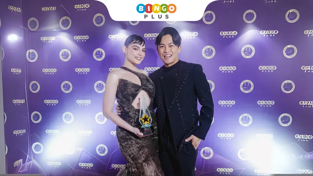 Rhian Ramos, BingoPlus Female TV Star of the Year; with her real-life partner Sam Versoza, BingoPlus Male TV Star of the Year posing at the BingoPlus sponsored photo wall.