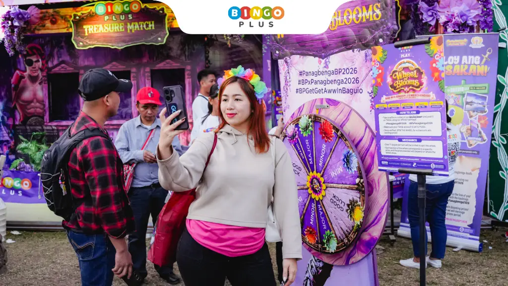 Players are taking photos in the interactive games, treasure hunt, and roulette game areas of BingoPlus