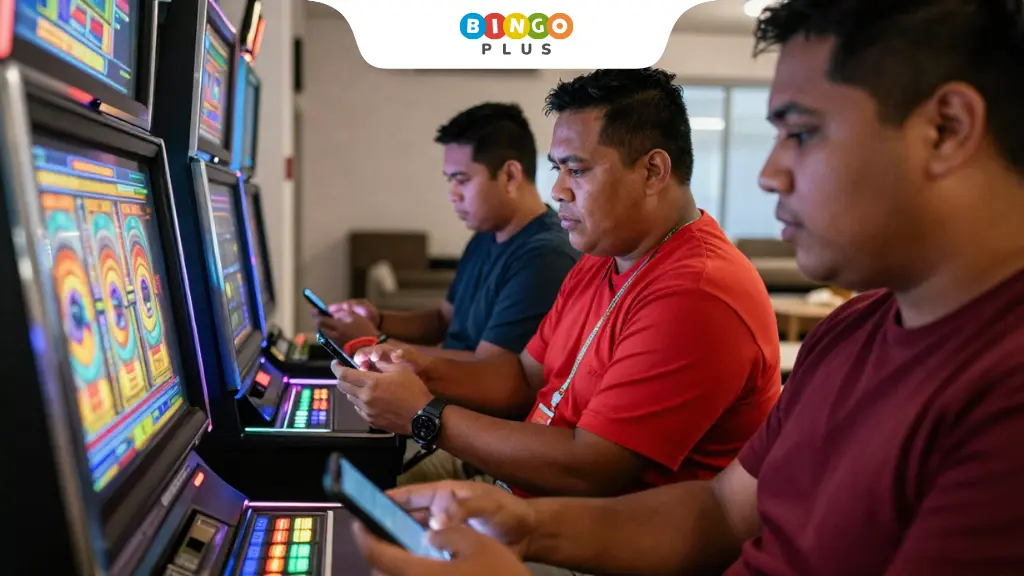 Players play online slot machines on their mobile phones, focusing intently on the spinning reel.
